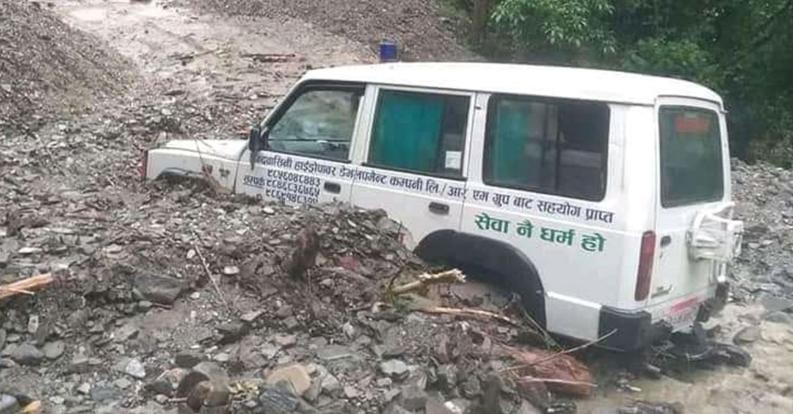 A landslide over ambulance, Patient is killed and driver injured